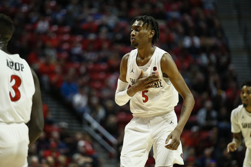 SAN DIEGO, February 16th, 2019 | San Diego State Aztecs vs. Boise State Broncos men's NCAA college basketball on Saturday, February 16th, 2019 at Viejas Arena in San Diego, CA. San Diego State forward Jalen McDaniels (5) reacts after making a basket in the first half against Boise State. Photo by Chadd Cady