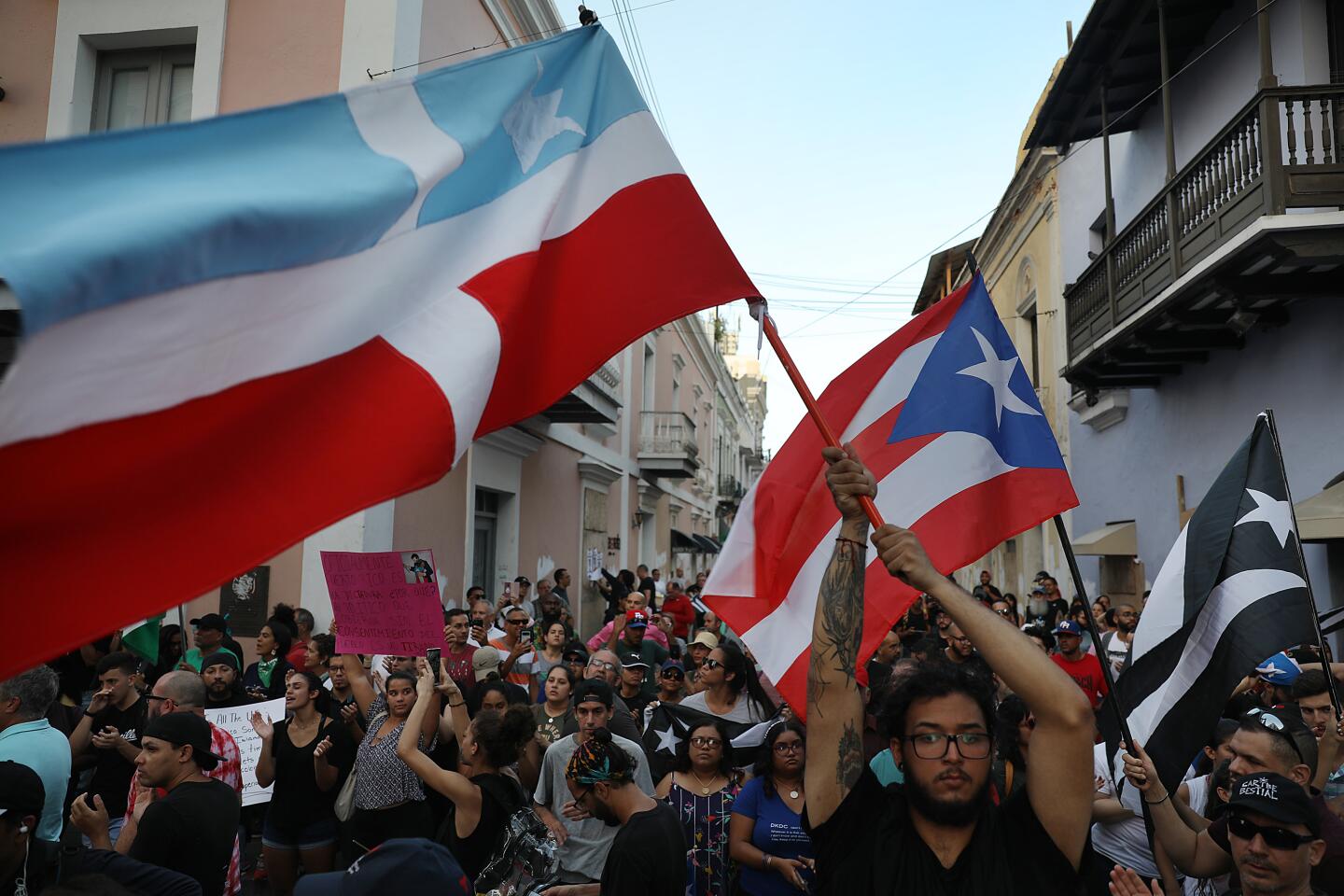 Protesters call for the resignation of Gov. Ricardo Rossello
