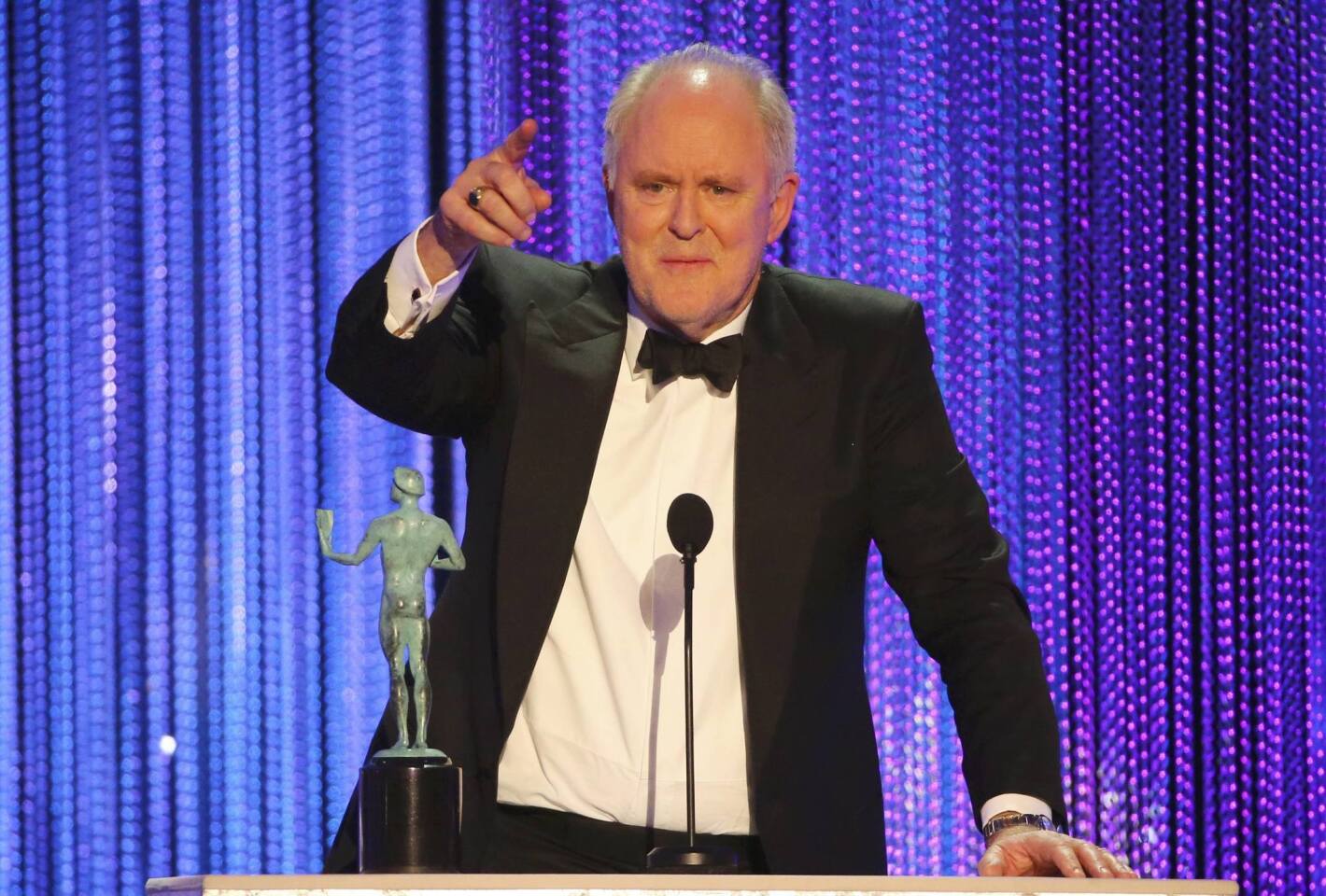 John Lithgow accepts his award during the 23rd Screen Actors Guild Awards in Los Angeles