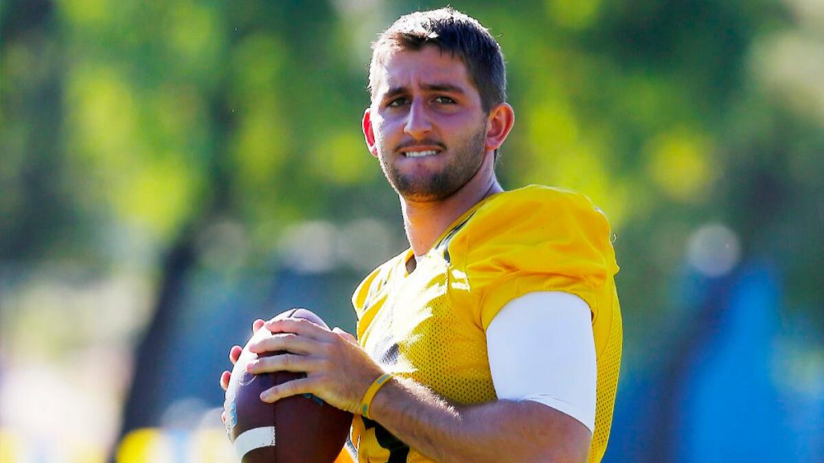 UCLA quarterback Josh Rosen warms up before a practice at Cal State San Bernardino on Aug. 15.