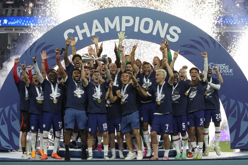 United States players celebrate after defeating Canada in a CONCACAF Nations League final.