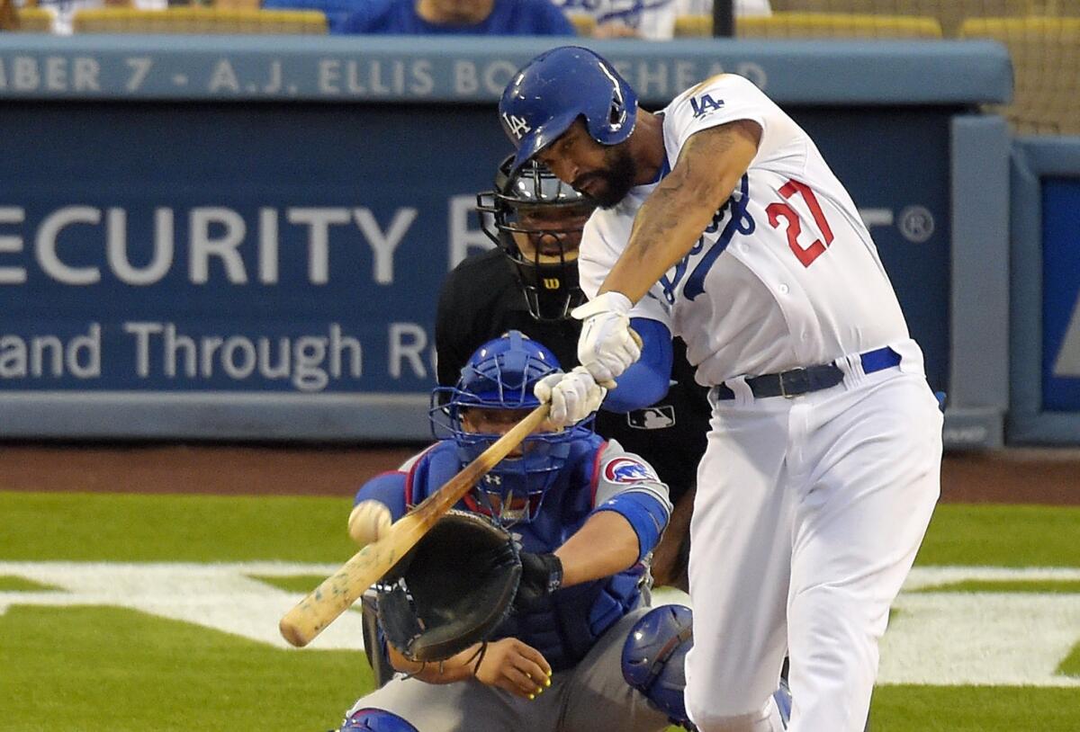 Matt Kemp hits a two-run home run in the fourth inning to give the Dodgers a 2-1 lead over the Chicago Cubs on Saturday night.