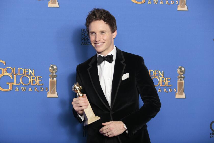 Eddie Redmayne in the press room with his lead actor in a drama award for his performance in "The Theory of Everything."