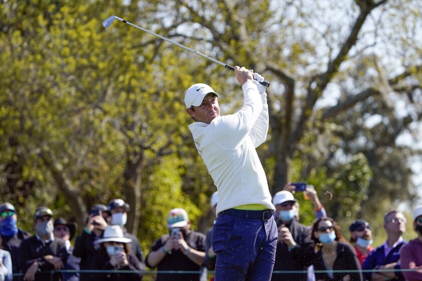 Rory McIlroy, of Northern Ireland, hits a shot from the seventh tee during the final round of the Arnold Palmer Invitational golf tournament Sunday, March 7, 2021, in Orlando, Fla. (AP Photo/John Raoux)