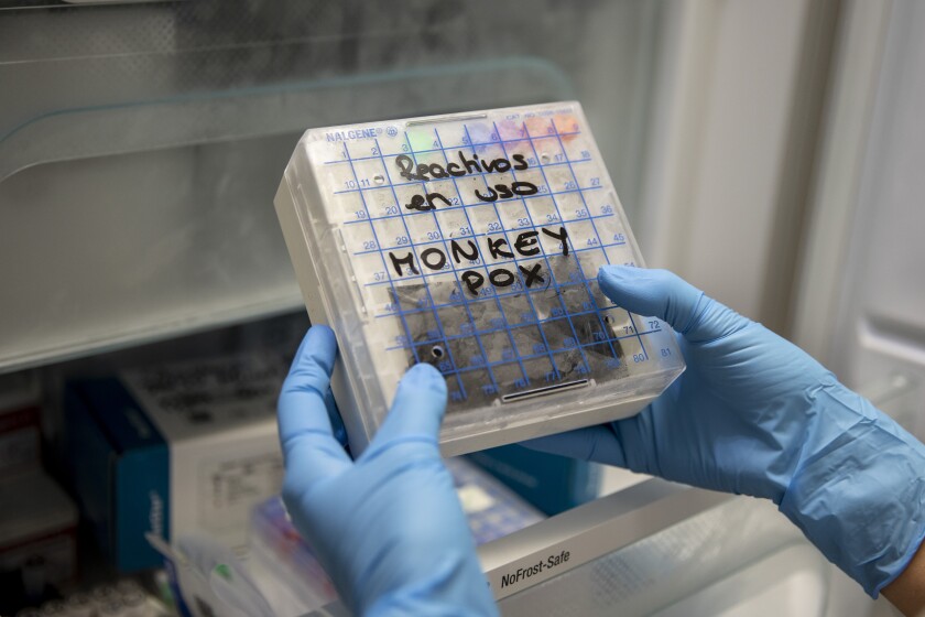 MADRID, SPAIN - JUNE 06: A medical laboratory technician picks up from a fridge a reactive to test suspected monkeypox samples at the microbiology laboratory of La Paz Hospital on June 06, 2022 in Madrid, Spain. Europe is at the centre of the monkeypox virus outbreak, the World Health Organisation reported 780 confirmed cases with Britain, Spain and Portugal reporting the largest numbers of patients. (Photo by Pablo Blazquez Dominguez/Getty Images)