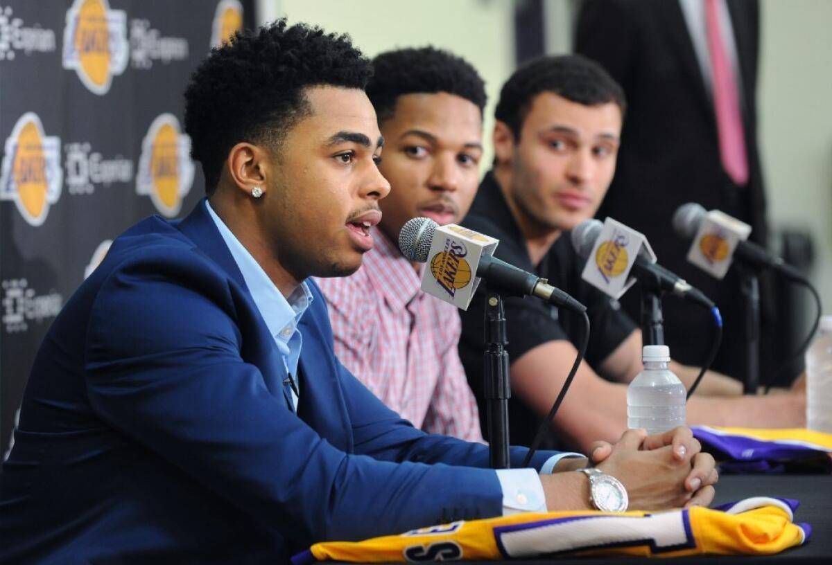 Laker draft picks, from left, D'Angelo Russell, Anthony Brown and Larry Nance Jr. answer questions during an introductory news conference in El Segundo on June 29.