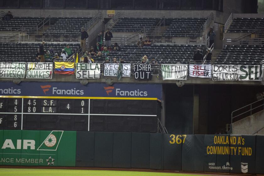 Oakland Athletics fans express their displeasure with the team's plans to move to Las Vegas, during the sixth inning of the A's baseball game against the Detroit Tigers, Thursday, Sept. 21, 2023, in Oakland, Calif. (AP Photo/D. Ross Cameron)