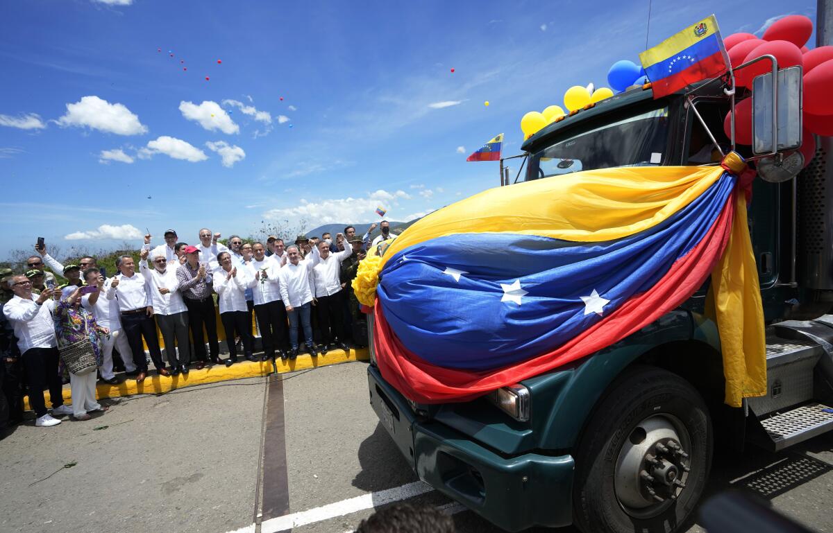 A Venezuelan cargo truck crosses the Simon Bolivar International Bridge into Colombia