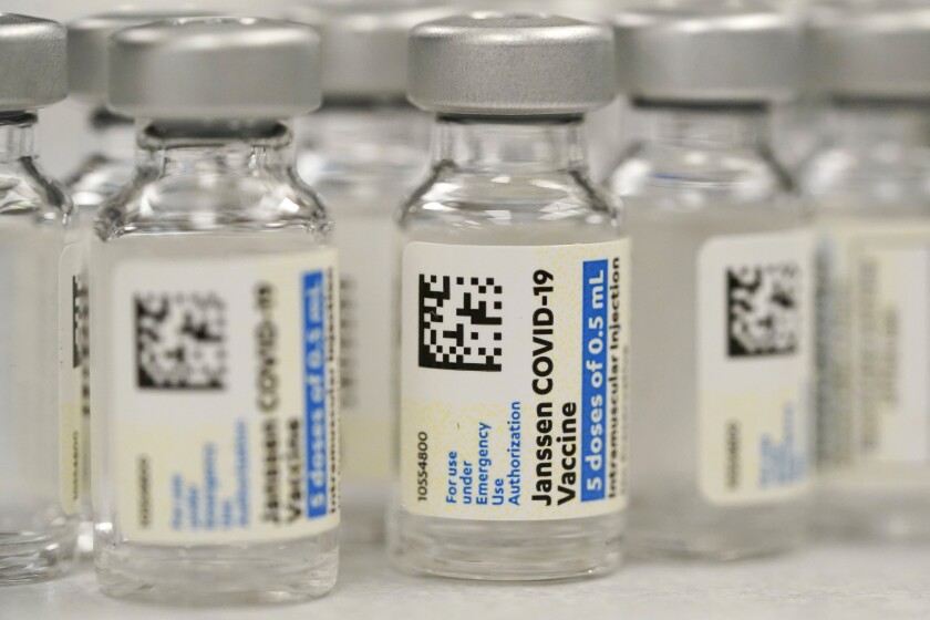 FILE - This Saturday, March 6, 2021 file photo shows vials of Johnson & Johnson COVID-19 vaccine at a pharmacy in Denver. On Thursday, June 10, 2021, Johnson & Johnson said that the U.S. Food and Drug Administration extended the expiration date on millions of doses of its COVID-19 vaccine by an extra six weeks. (AP Photo/David Zalubowski, File)