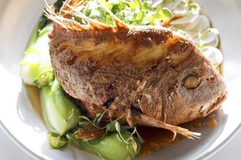 On the "old school" menu at Fishing With Dynamite, a whole New Zealand Thai Snapper for two, with ginger, garlic, kaffir lime and bok choy, for $48.