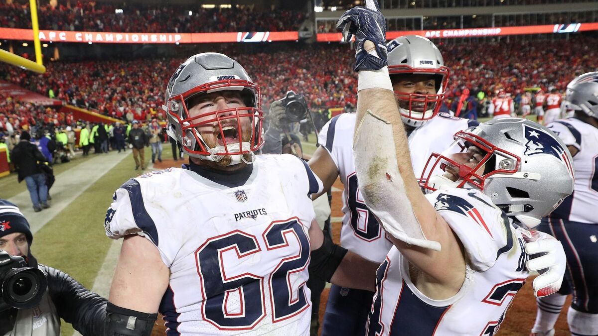 New England Patriots' Rex Burkhead (34) celebrates after scoring the game-winning touchdown to defeat the Kansas City Chiefs in overtime during the AFC championship game on Sunday.