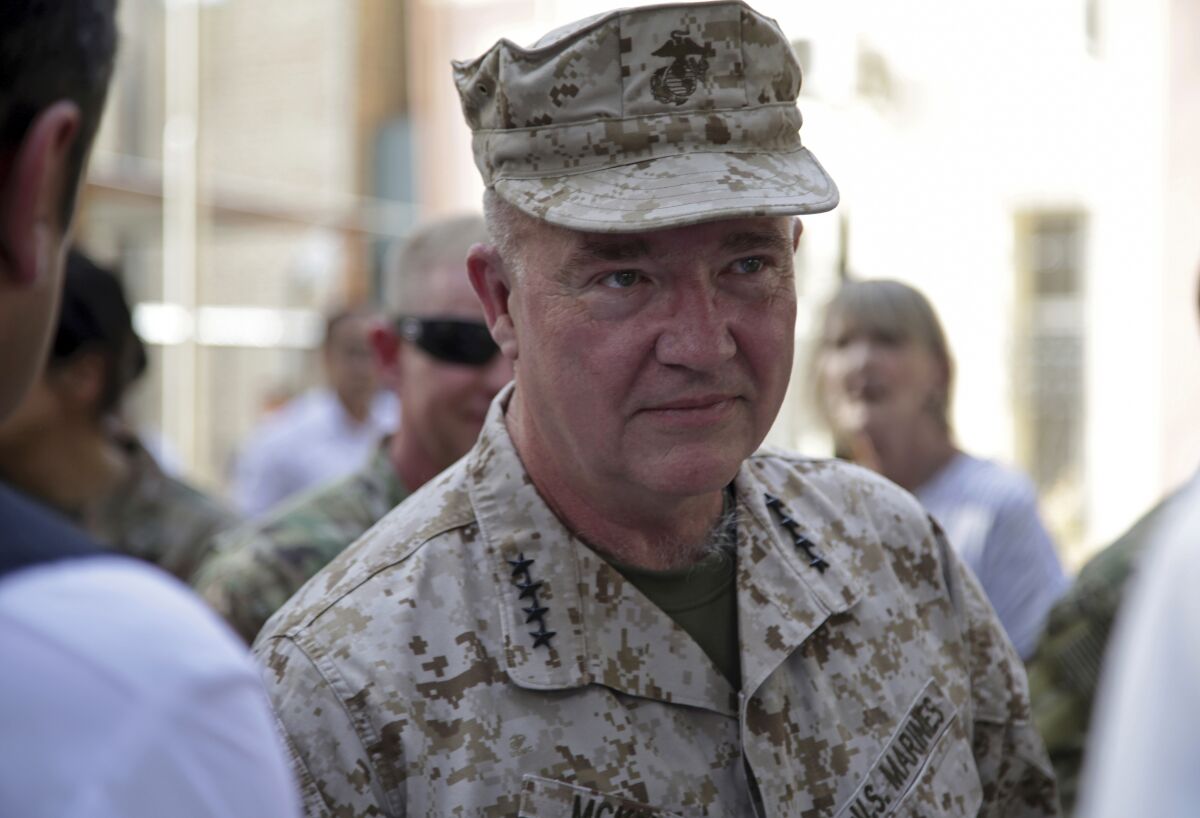 FILE - Marine Gen. Frank McKenzie, the head of U.S. Central Command, attends at a ceremony where Gen. Scott Miller, who has served as America's top commander in Afghanistan since 2018, handed over command, at Resolute Support headquarters, in Kabul, Afghanistan, July 12, 2021. McKenzie says the U.S. will keep the current 2,500 troops in Iraq for the foreseeable future, despite their shift to a non-combat role, and they will still provide air support and other military support for Iraq's continuing fight against the Islamic State. (AP Photo/Ahmad Seir, File)