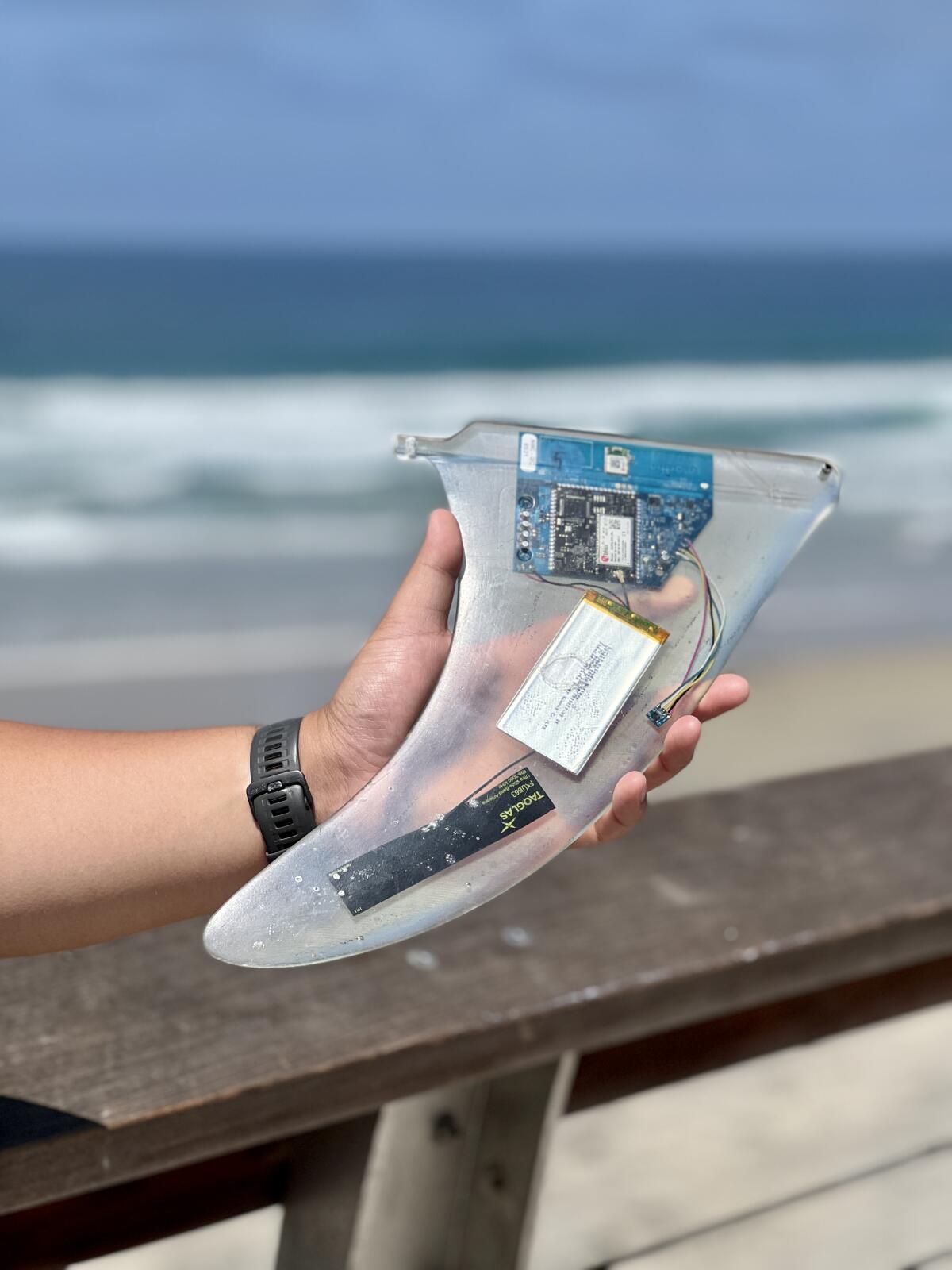 The Smartfin replaces a surfboard's fin to help scientists track temperatures in the waves.