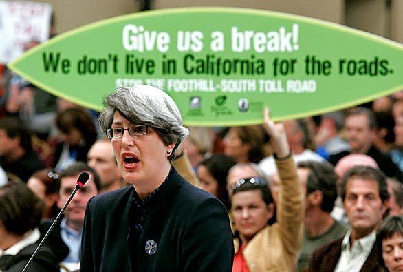 Elizabeth Goldstein, president of the California State Parks Foundation, speaks against the plan. "If the toll road is permitted to proceed, we will all be spending decades in rooms like this all across the state fighting to protect yet another special place," she said.