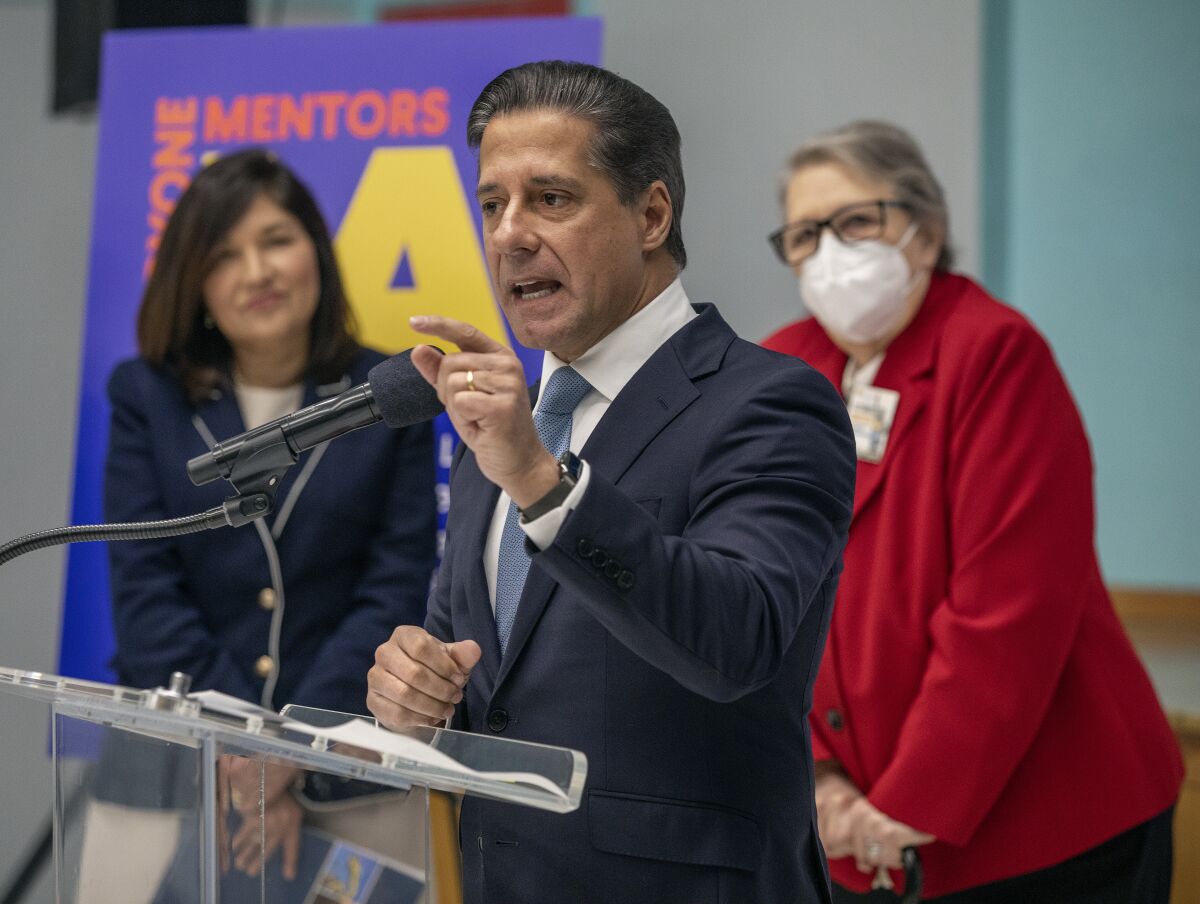 L.A. schools Superintendent Alberto Carvalho speaks from behind a podium.