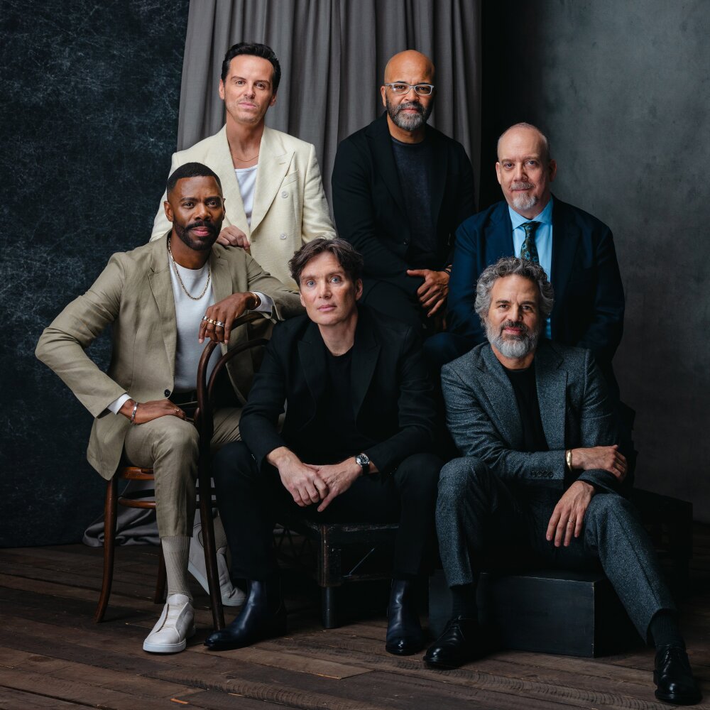 Six acclaimed actors pose together before a dark background with a grey curtain for the 2023 Envelope Actors Roundtable.