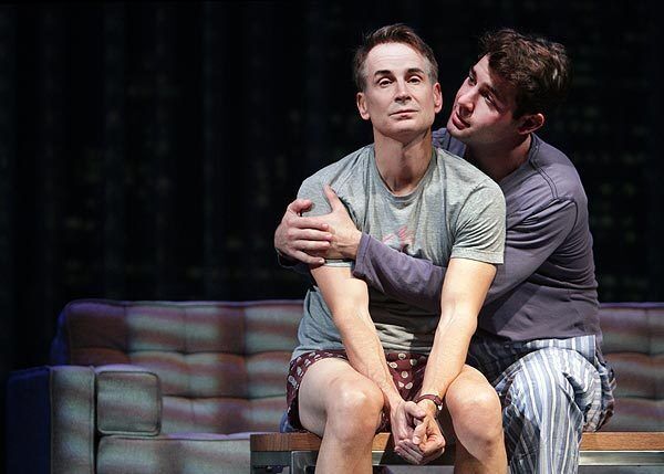 Playwright Geoffrey Nauffts, left, performs at the Geffen as Adam, a high-stress, know-it-all New Yorker whose wariness about religion works overtime when he falls in love with openhearted Luke (James Wolk), a Christian of deep faith.