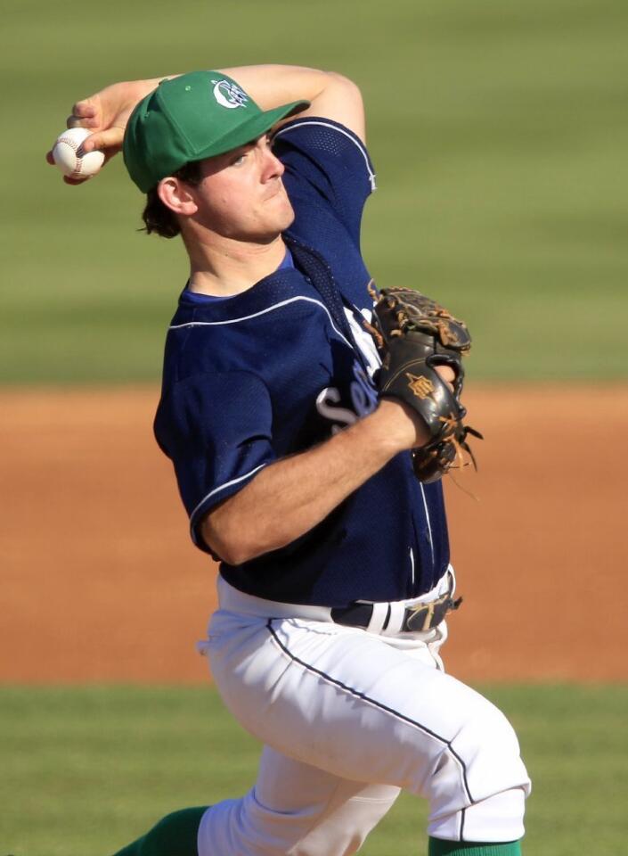 Corona del Mar High starter Brett Olson pitches the ball against Newport Harbor during Game 1 in a Battle of the Bay doubleheader at Anteater Ballpark on Monday.