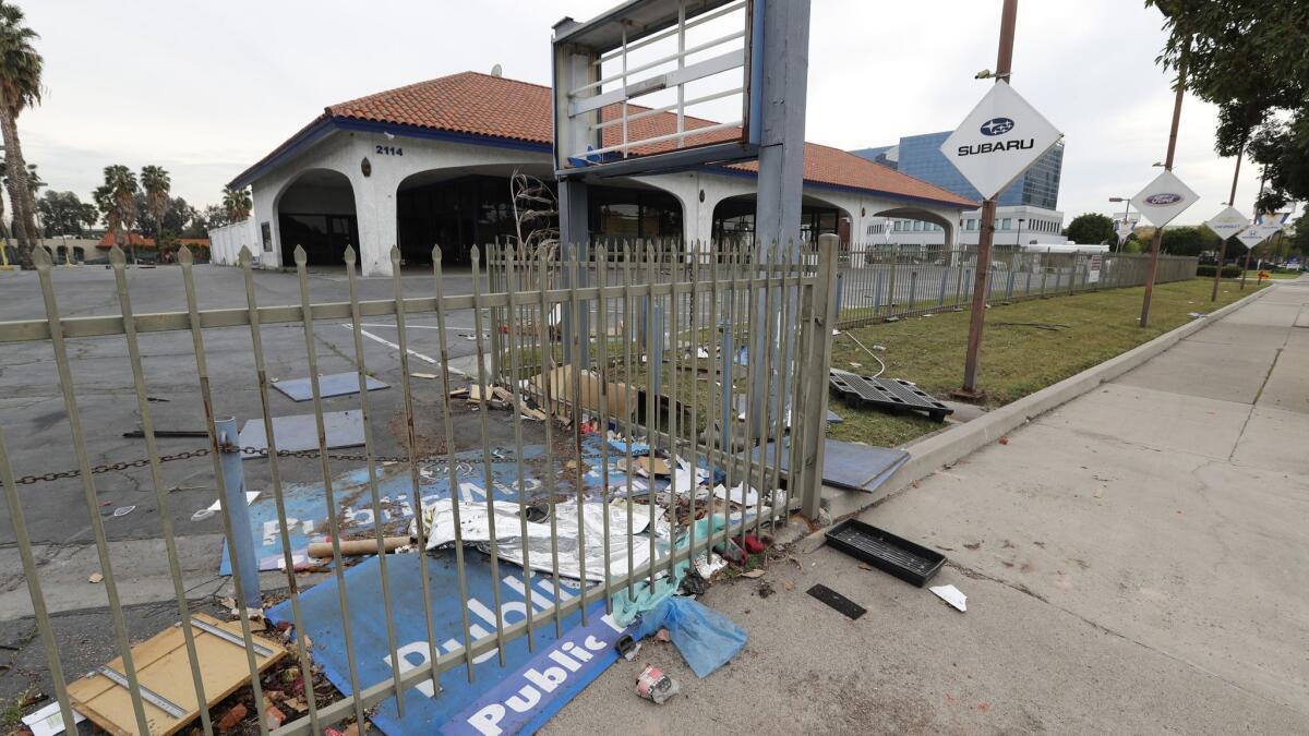 Affordable housing developer Pacific Cos. wants to build hundreds of low-income housing units for families on the site of a shuttered auto dealership in Santa Ana.