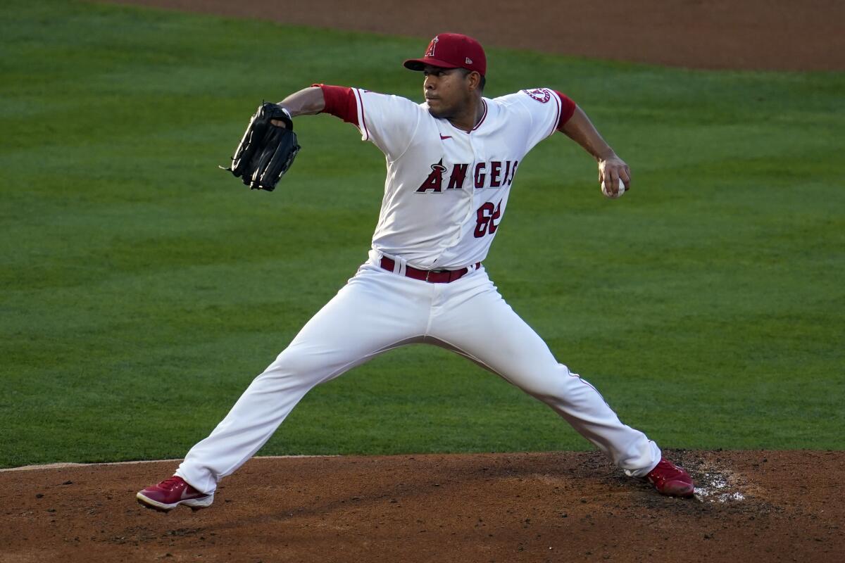 Los Angeles Angels starting pitcher Jose Quintana throws to the Tampa Bay Rays.