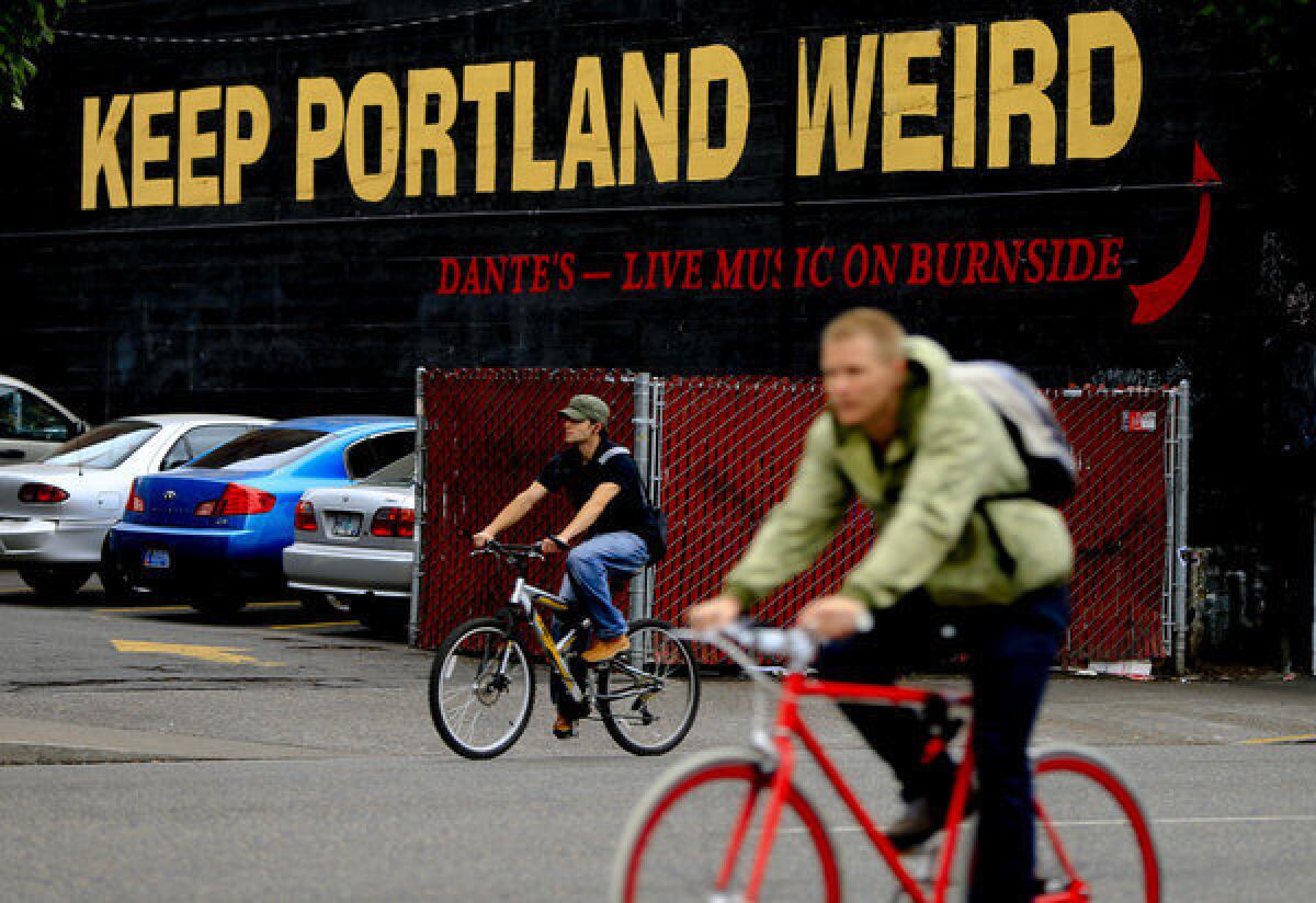 A sign pokes fun at Portland, Ore., while also advertising a downtown nightclub.