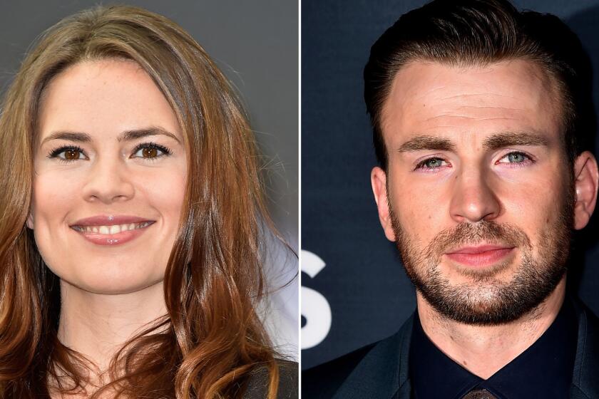 Hayley Atwell and Chris Evans looked almost as surprised as the bride-to-be did when a Saturday photo opp turned into a proposal at Salt Lake Comic Con in Salt Lake City.