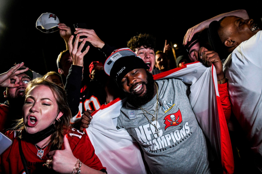 Tampa Bay Buccaneers fans celebrate their team's victory over the Kansas City Chiefs during Super Bowl LV.
