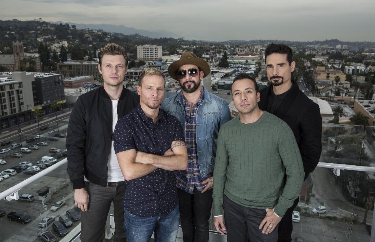 The Backstreet Boys, from left, Nick Carter, Brian Littrell, A.J. McLean, Howie Dorough and Kevin Richardson, stand for a portrait at the W Hotel.