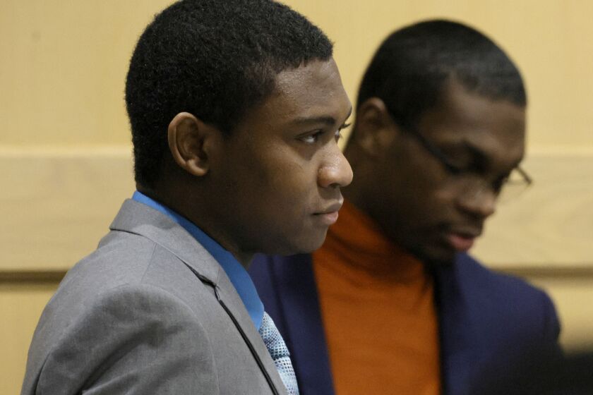 Suspected shooting accomplice Trayvon Newsome, left, and shooting suspect Michael Boatwright enter the courtroom for opening statements in the XXXTentacion murder trial at the Broward County Courthouse in Fort Lauderdale, Fla., Tuesday, Feb. 7, 2023. Emerging rapper XXXTentacion, born Jahseh Onfroy, 20, was killed during a robbery outside of Riva Motorsports in Pompano Beach in 2018. (Amy Beth Bennett/South Florida Sun-Sentinel via AP)