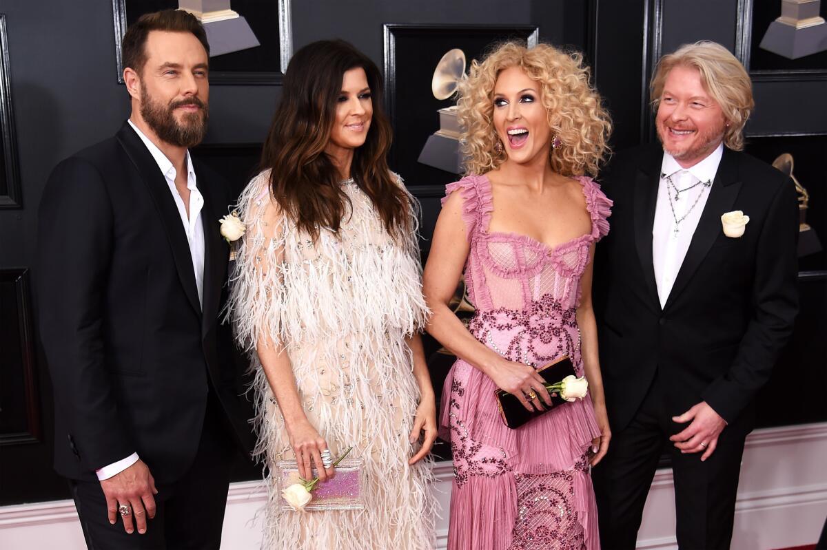 Jimi Westbrook, Karen Fairchild, Kimberly Schlapman, and Philip Sweet of Little Big Town on the Grammy red carpet