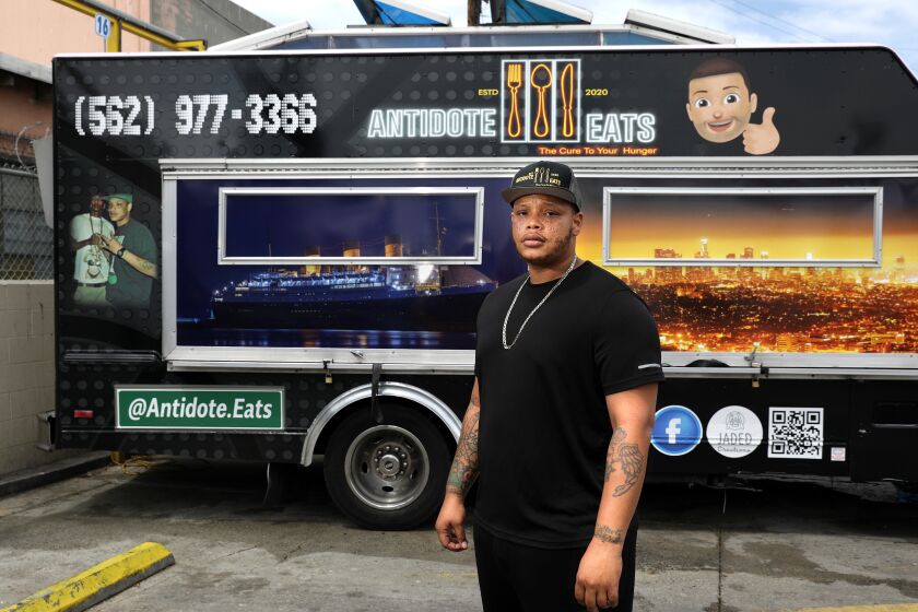 HUNTINGTON PARK-CA-JUNE 2, 2020: Anthony Suggs is photographed with his food truck parked at the Food Truck Commissary in Huntington Park on Tuesday, June 2, 2020. Suggs, who grew up in Long Beach, was sentenced to prison for six years for a non-violent marijuana offense and released when marijuana was legalized. Since then, he's been trying to get his life back on track by opening a food business, Antidote Eats. (Christina House / Los Angeles Times)