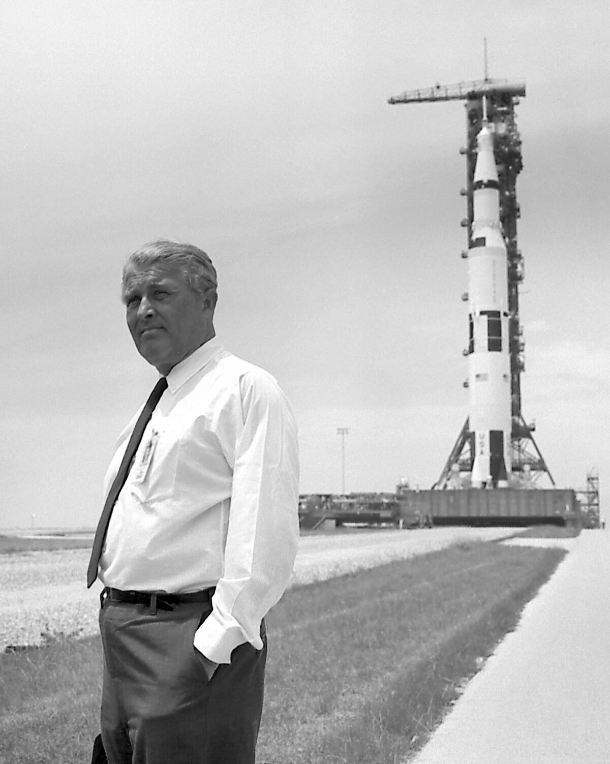 Wernher von Braun and the Saturn V rocket that propelled Apollo 11. The rocket was developed by the Marshall Space Flight Center in Huntsville, Ala., under von Braun's direction.
