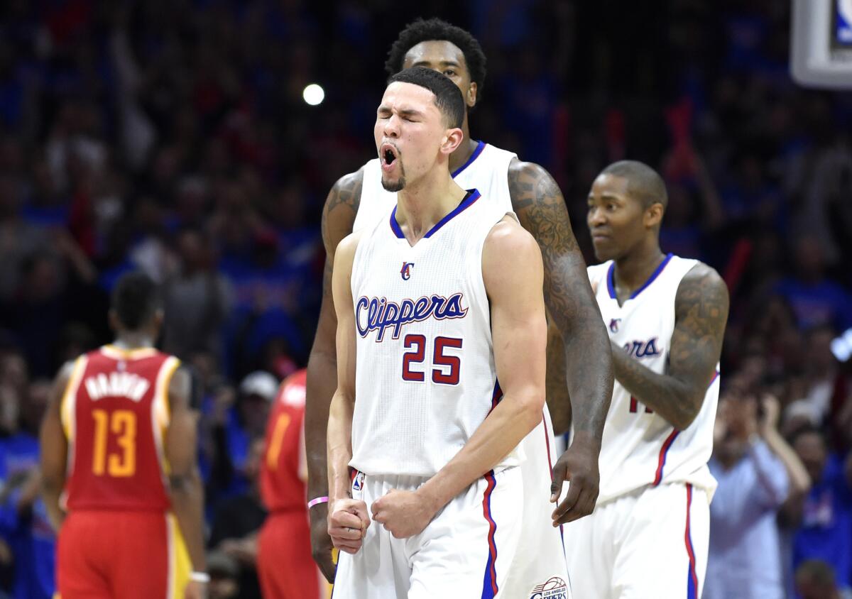 Clippers guard Austin Rivers celebrates after scoring against the Rockets in the second half of Game 3 of a playoff series at Staples Center.