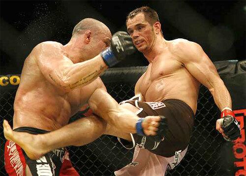 Rick Franklin lands a kick to the side of Wanderlei Silva in their bout at UFC 99 in Cologne, Germany.