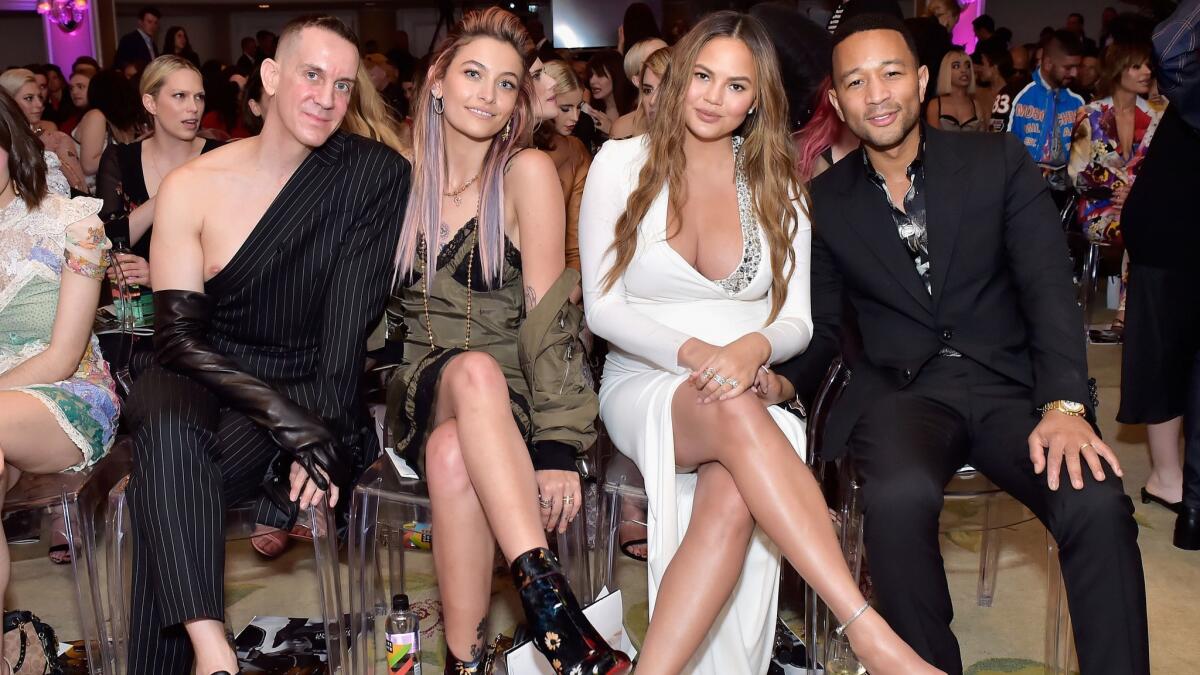Honoree Jeremy Scott, from left, Paris Jackson, Chrissy Teigen and John Legend add to the style of the Daily Front Row's fourth annual Fashion Los Angeles Awards. The event was at the Beverly Hills Hotel in Beverly Hills on Sunday.