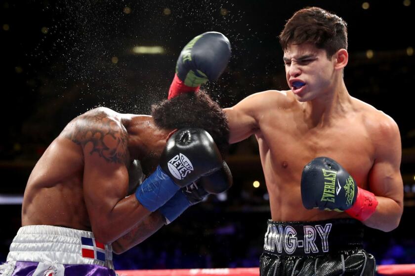 NEW YORK, NEW YORK - DECEMBER 15: Ryan Garcia (R) lands a punch against Braulio Rodriguez (L) during their Super Featherweight bout at Madison Square Garden on December 15, 2018 in New York City. (Photo by Al Bello/Getty Images) ** OUTS - ELSENT, FPG, CM - OUTS * NM, PH, VA if sourced by CT, LA or MoD **