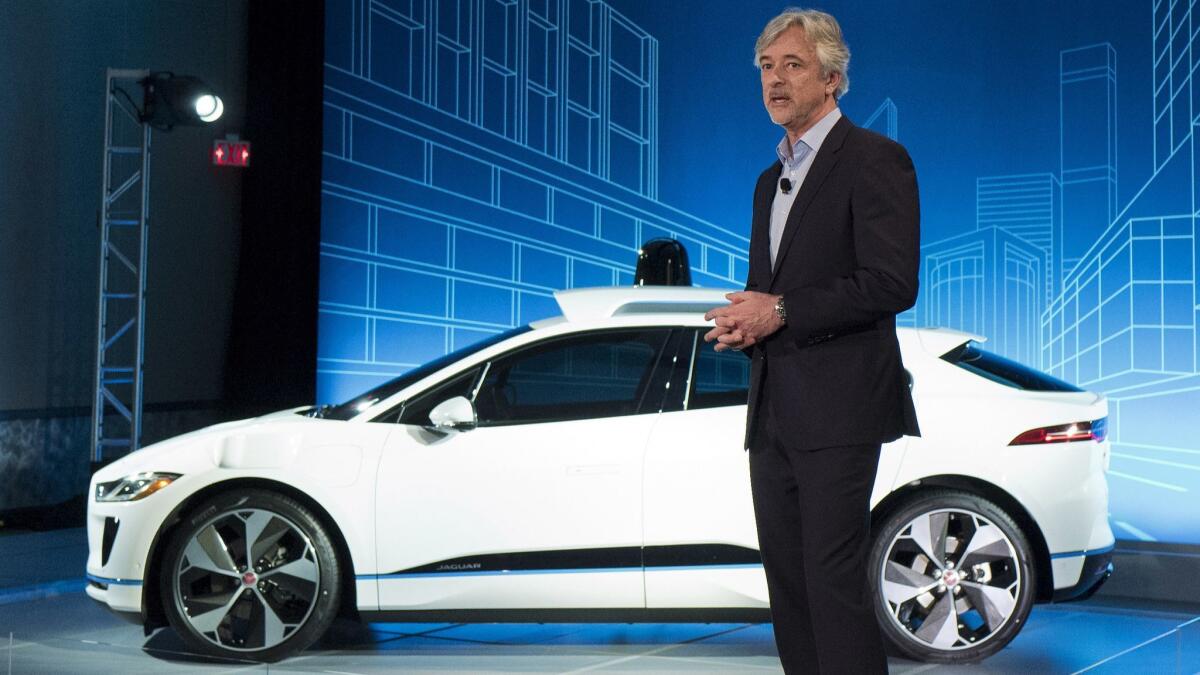 Waymo CEO John Krafcik in March, announcing the company would buy up to 20,000 all-electric Jaguar I-Pace cars for its planned driverless ride-hailing service.