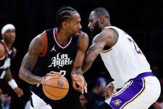 LOS ANGELES, CA - JANUARY 07: LA Clippers forward Kawhi Leonard (2) handles the ball.