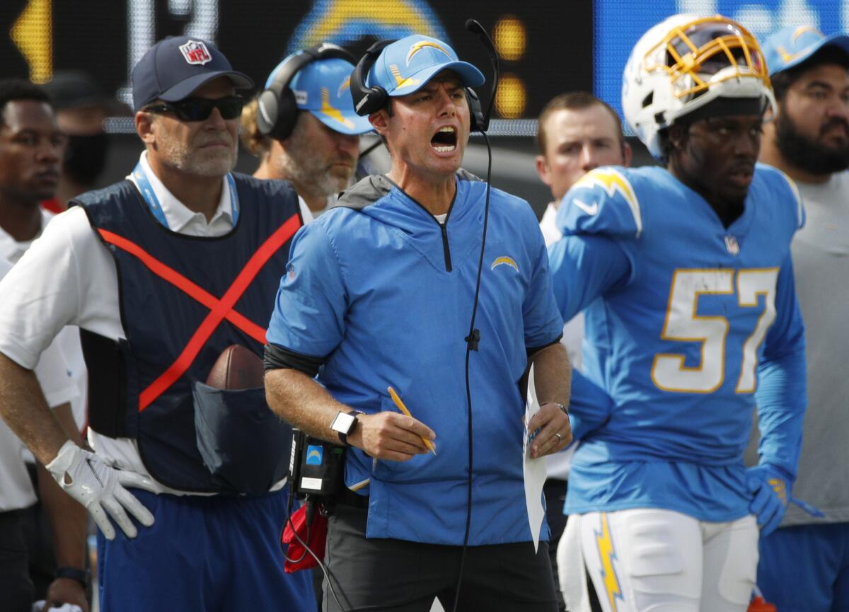 Chargers coach Brandon Staley shouts instructions after a fumble against the Cleveland Browns.
