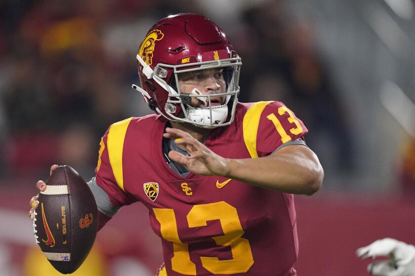 USC quarterback Caleb Williams looks to pass against Arizona