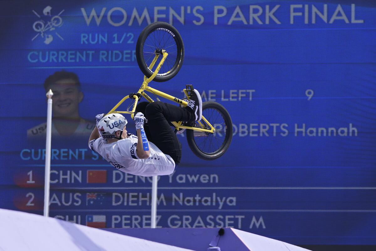 Hannah Roberts takes a fall during her first run of the cycling BMX freestyle women's park final in Paris on Wednesday.