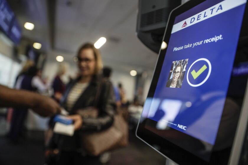 LOS ANGELES, CA, FRIDAY, SEPTEMBER 6, 2019 - Delta Air Lines begins to allow passengers to use facial recognition cameras to confirm their identity at an LAX boarding gate. Most passengers pause to have their picture taken before boarding on a flight to Paris, France. (Robert Gauthier/Los Angeles Times)