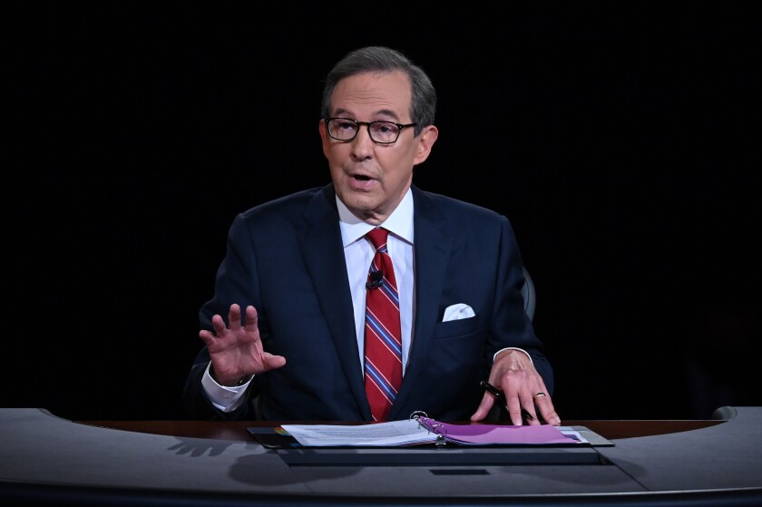 FILE - Moderator Chris Wallace of Fox News speaks as President Donald Trump and Democratic presidential candidate former Vice President Joe Biden participate in the first presidential debate in Cleveland on Sept. 29, 2020. Wallace says he's leaving the network after 18 years and is “ready for a new adventure.” Wallace made the announcement, Sunday, Dec. 12, 2021, at the end of the weekly news show he moderates, “Fox News Sunday.”(Olivier Douliery/Pool via AP, File)
