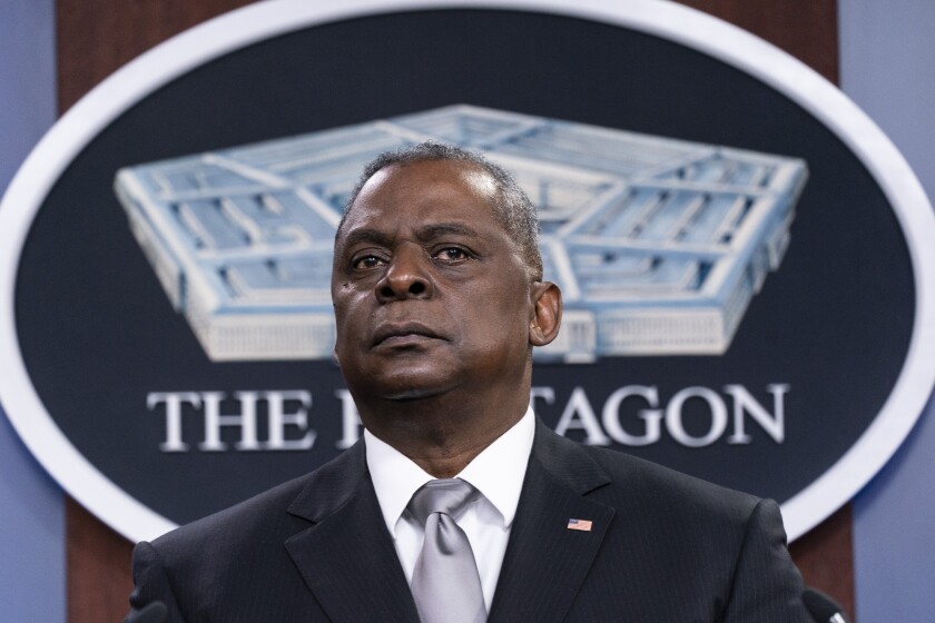 FILE - Secretary of Defense Lloyd Austin listens to a question as he speaks during a media briefing at the Pentagon in Washington, in this Friday, Feb. 19, 2021, file photo. U.S. Defense Secretary Lloyd Austin met Sunday, April 11, 2021, in Tel Aviv with his Israeli counterpart and reinforced American support. (AP Photo/Alex Brandon, File)