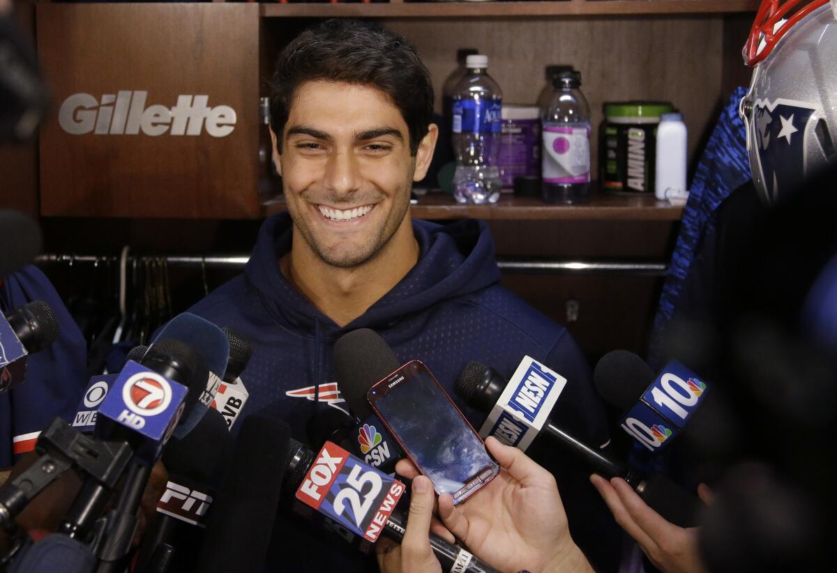 New England quarterback Jimmy Garoppolo talks to reporters on Sept. 1, 2015.