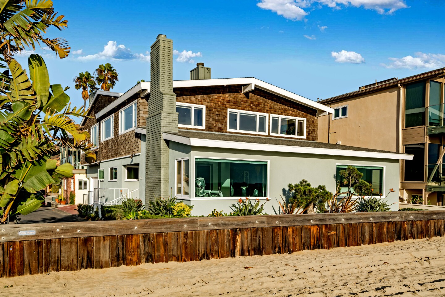 Beach house Clad in wood shingles, this charming beach house boasts expansive living spaces and an unbeatable location. It’s listed by Chase and Blake Nicolai of Nicolai Real Estate. Address: 5501 E. Seaside Walk, Long Beach, CA 90803 Price: $2.995 million