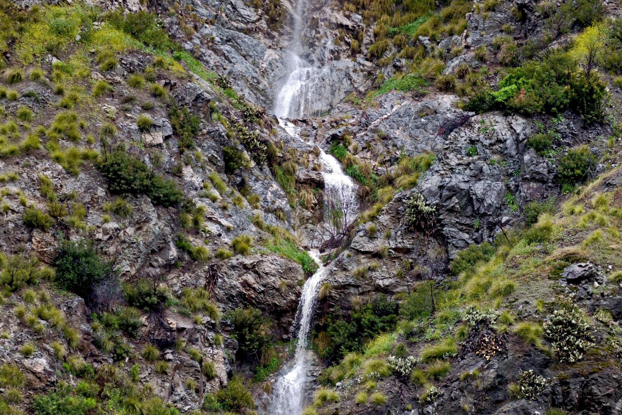 A temporary waterfall   alongside Highway 39 after recent heavy rains 