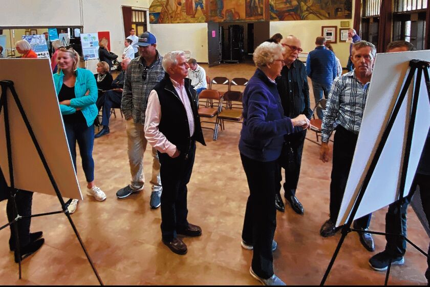Members of the public view the Village Streetscape Plan during a community open house, held at La Jolla Recreation Center, March 6, 2020.
