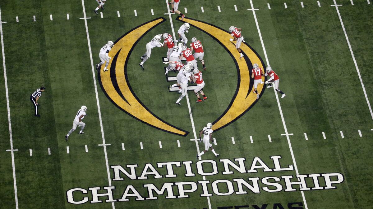 Ohio State and Oregon play for the first College Football Playoff national championship at AT&T Stadium in Arlington, Texas, on Jan. 12.