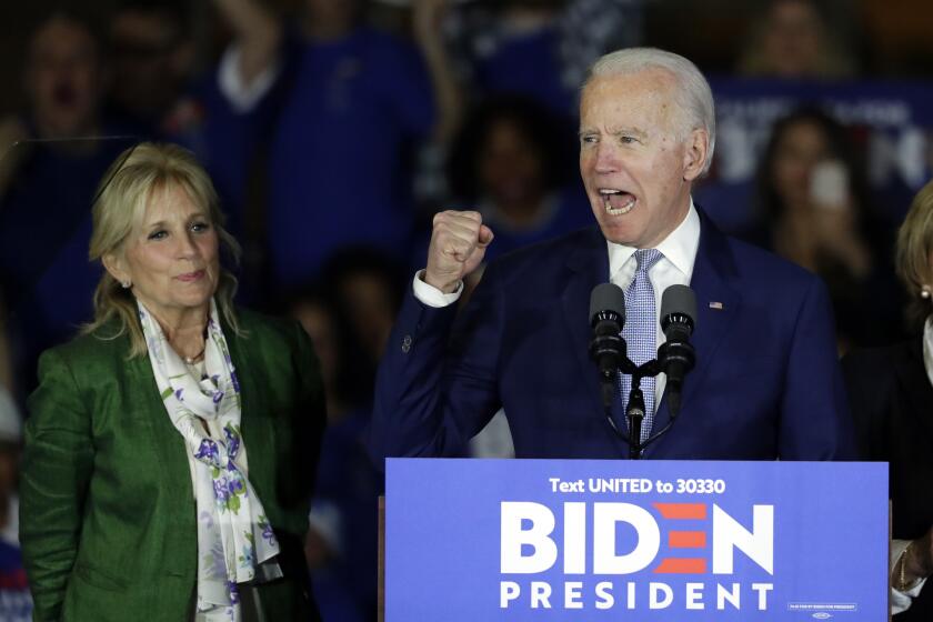 Democratic presidential candidate former Vice President Joe Biden, accompanied by his wife Jill Biden, speaks at a primary election night campaign rally Tuesday, March 3, 2020, in Los Angeles. (AP Photo/Chris Carlson)